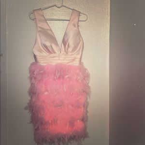 Feathered pink prom dress with deep v-neck